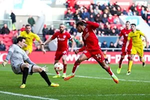Images Dated 4th March 2017: Bristol City vs Burton Albion: Bobby Reid's Shot Saved by Jon McLaughlin