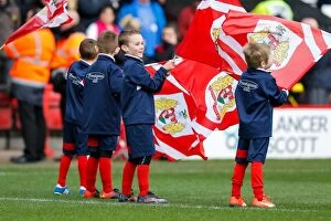 Images Dated 5th March 2016: Bristol City vs. Cardiff City: Flag-Bearing Fans at Ashton Gate Stadium, March 2016