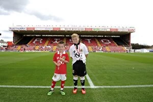 Images Dated 16th August 2014: Bristol City vs Colchester United Mascot Showdown in Sky Bet League One at Ashton Gate