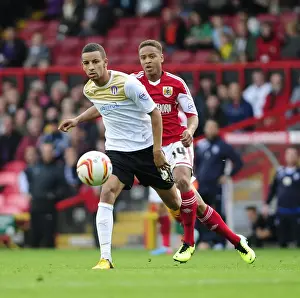 Bristol City V Colchester United Prints: Bristol City vs Colchester United: Reid vs Eastmond - A Football Rivalry Unfolds