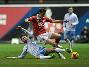 Images Dated 10th December 2014: Bristol City vs Coventry City: Joe Bryan Tackled by Jim O'Brien during Johnstones Paint Trophy Match