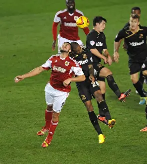 Bristol City V Crawley Town Prints: Bristol City vs Crawley Town: Intense Aerial Battle Between Derrick Williams and Emile Sinclair