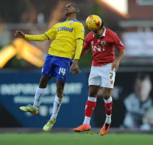 Bristol City vs Crawley Town: Intense Header Battle Between Korey Smith and Lewis Young