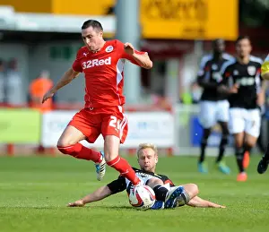 Crawley Town V Bristol City Prints: Bristol City vs Crawley Town: Intense Moment between Simon Gillett and Mike Jones
