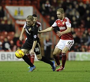 Images Dated 5th November 2013: Bristol City vs Crawley Town: Wagstaff Chases Down Adams