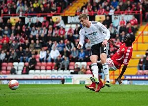 Images Dated 31st March 2012: Bristol City vs Derby County: Albert Adomah Tackles Steve Davies on the Field