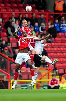 Bristol City V Derby County Prints: Bristol City vs Derby County: Intense Aerial Battle Between Louis Carey and Steve Davies