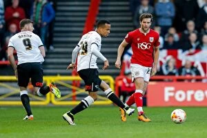 Images Dated 19th April 2016: Bristol City vs. Derby County: Intense Moment Between Adam Matthews and Marcus Olsson