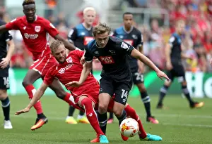 Bristol City V Derby County Prints: Bristol City vs Derby County: Joel Ekstrand Fouls James Wilson