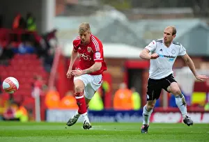 Bristol City V Derby County Prints: Bristol City vs Derby County: Jon Stead vs Paul Green Battle for Possession at Ashton Gate Stadium