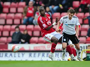 Bristol City V Derby County Prints: Bristol City vs Derby County: Kalifa Cisse Fights for Ball at Ashton Gate Stadium