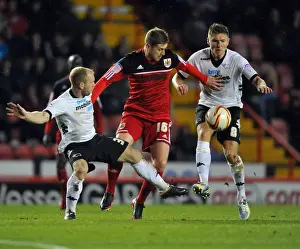 Bristol City V Derby County Prints: Bristol City vs Derby County: Steven Davies Fights for Possession Amidst Jeff Hendrick and Gareth Roberts