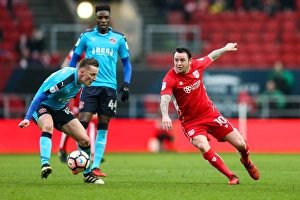Framed Print : Bristol City vs Fleetwood Town: Intense Moment as Lee Tomlin Clashes with George Glendon in The Emirates FA Cup Third Round