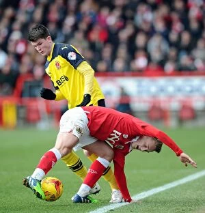 Images Dated 1st February 2015: Bristol City vs Fleetwood Town: George Saville vs Gareth Evans Battle for Ball in Sky Bet League