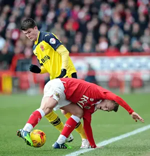 Bristol City V Fleetwood Town Prints: Bristol City vs Fleetwood Town: George Saville vs Gareth Evans Battle for Ball in Sky Bet League One Clash