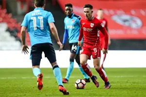 Third Round Prints: Bristol City vs Fleetwood Town: Intense Clash between Josh Brownhill and Bobby Grant at Ashton Gate Stadium