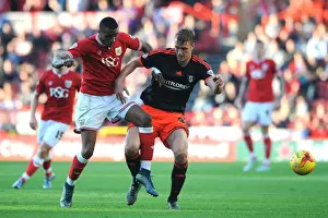 Bristol City V Fulham Prints: Bristol City vs Fulham: Intense Battle for the Ball between Kodjia and Burn