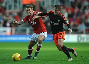 Bristol City vs Fulham: Intense Battle for Possession - Simon Cox vs Lasse Vigen Christensen