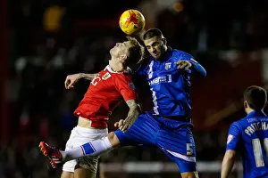 Framed Print : Bristol City vs Gillingham: Aden Flint vs Max Ehmer Aerial Battle Framed Print : Bristol City vs Gillingham: Aden Flint vs Max Ehmer Aerial Battle