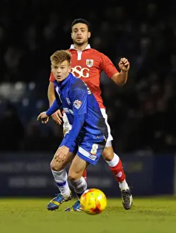 Bristol City vs Gillingham: Derrick Williams Fends Off Jake Hessenthaler's Pressure on the Pitch