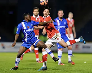 Bristol City vs Gillingham: Intense Aerial Battle Between Greg Cunningham and Jermaine McGlashan