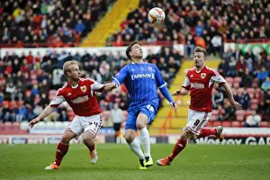 Bristol City V Gillingham Prints: Bristol City vs Gillingham: Tense Moment as McDonald Faces Off Against Gillett and Elliott