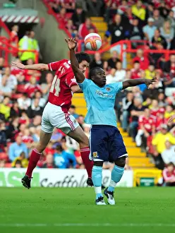 Bristol City V Hull City Prints: Bristol City vs Hull City: Cole Skuse vs Aaron Mclean Battle in Championship Match