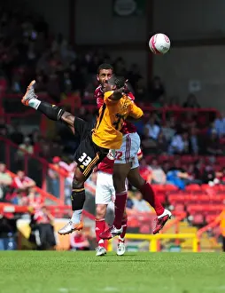 Bristol City vs Hull City: Intense Aerial Battle Between Lowein Nyatanga and Aaron Mclean