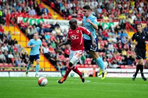 Bristol City V Hull City Prints: Bristol City vs Hull City: Jamal Campbell-Ryce vs Robert Brady Battle in Championship Match