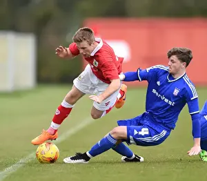 Bristol City V Ipswich U21s Prints: Bristol City vs Ipswich Town: Joe Morrell vs James Blanchfield - Intense Battle on the Field