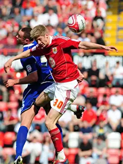 Bristol City V Ipswich Town Prints: Bristol City vs Ipswich Town: Jon Stead vs Damien Delaney's Aerial Battle in Championship Football
