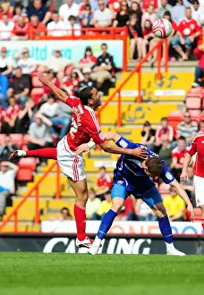 Bristol City V Ipswich Town Prints: Bristol City vs Ipswich Town: Lewin Nyatanga vs Connor Wickham - Championship Battle at Ashton Gate