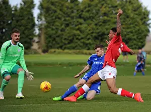Bristol City V Ipswich U21s Prints: Bristol City vs Ipswich Town: Marley Bishop vs Joe Robinson - A Clash at Failand Training Ground