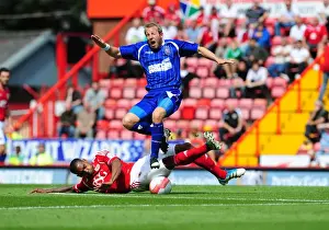 Bristol City V Ipswich Town Prints: Bristol City vs Ipswich Town: Marvin Elliott Tackles Lee Bowyer - Championship Clash at Ashton Gate