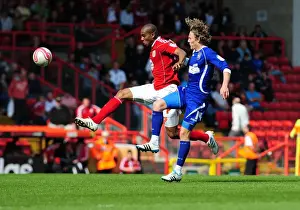 Bristol City vs Ipswich Town: Marvin Elliott vs Jimmy Bullard Battle for Ball in Championship Match, April 2011