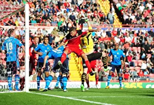 Bristol City vs Leeds United: Intense Aerial Battle Between James Wilson and Paddy Kenny