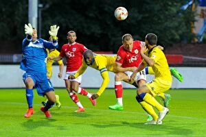 Images Dated 19th August 2015: Bristol City vs Leeds United: Intense Battle – Wagstaff's Header Thwarted by Bamba and Bellusci