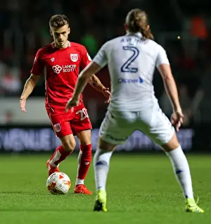 Framed Print : Bristol City vs Leeds United: Jamie Paterson vs Luke Ayling - Intense Battle at Ashton Gate