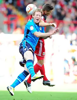 Bristol City V Leeds United Prints: Bristol City vs Leeds United: Wilson vs Becchio's Aerial Battle in Championship Football