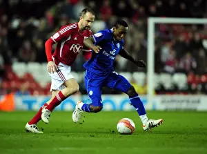Bristol City V Leicester City Prints: Bristol City vs Leicester City: A Battle for the Ball between Louis Carey and Lloyd Dyer