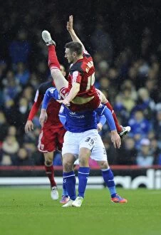 Images Dated 12th January 2013: Bristol City vs Leicester City: Stephen McManus Takes a Tumble as Chris Wood Presses On