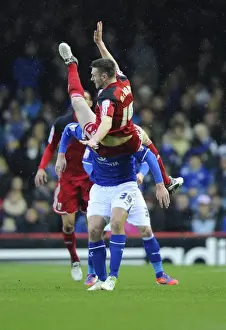 Framed Print : Bristol City vs Leicester City: Stephen McManus Takes a Tumble as Chris Wood Presses On