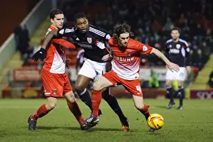 Bristol City vs Leyton Orient: Intense Midfield Battle Between Jay Emmanuel-Thomas and Romain Vincelot