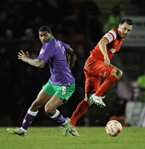 Images Dated 3rd March 2015: Bristol City vs Leyton Orient: Mark Little and Andrea Dossena Clash in Sky Bet League One Match