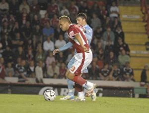 Images Dated 29th August 2007: Bristol City vs Manchester City Rivalry: Lee Trundle's Clash of Football Titans