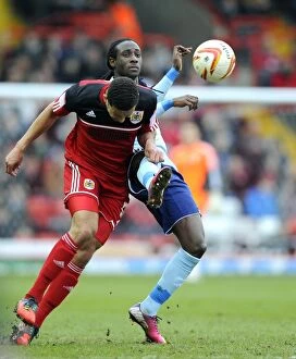 Images Dated 9th March 2013: Bristol City vs Middlesbrough: Lewin Nyatanga vs Marvin Emnes - A Battle for Supremacy in