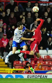 Bristol City V Millwall Prints: Bristol City vs Millwall: Intense Aerial Battle Between Liam Fontaine and Darius Henderson
