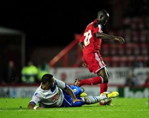 Images Dated 2nd October 2012: Bristol City vs Millwall: Intense Moment as Albert Adomah Clashes with Liam Trotter