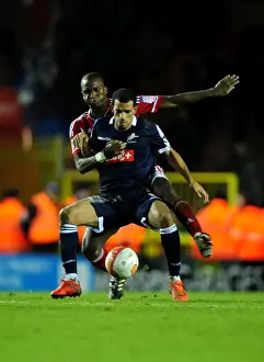 Bristol City V Millwall Prints: Bristol City vs Millwall: Kalifa Cisse vs Hameur Bouazza Battle for the Ball - Championship Match