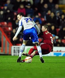 Images Dated 2nd October 2012: Bristol City vs Millwall: Mark Wilson Tackles Scott Malone in Championship Clash